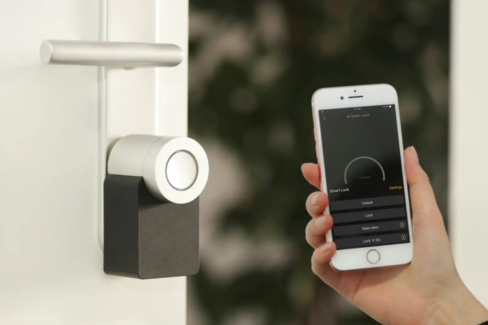 Smart lock on a front door controlled from a phone app