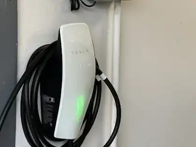 EV charger mounted on a garage wall